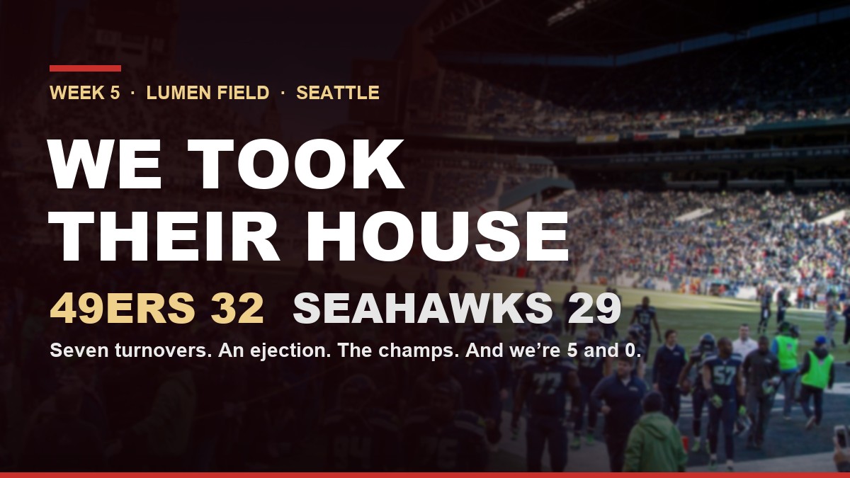 Lumen Field crowd behind the words We Took Their House, 49ers 32, Seahawks 29