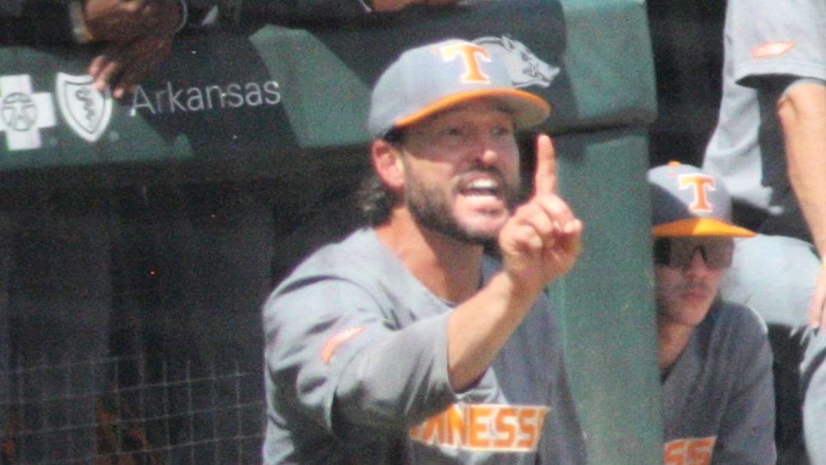 Tony Vitello yelling and pointing a finger from the dugout steps, the same posture that has now gotten him ejected five times this season
