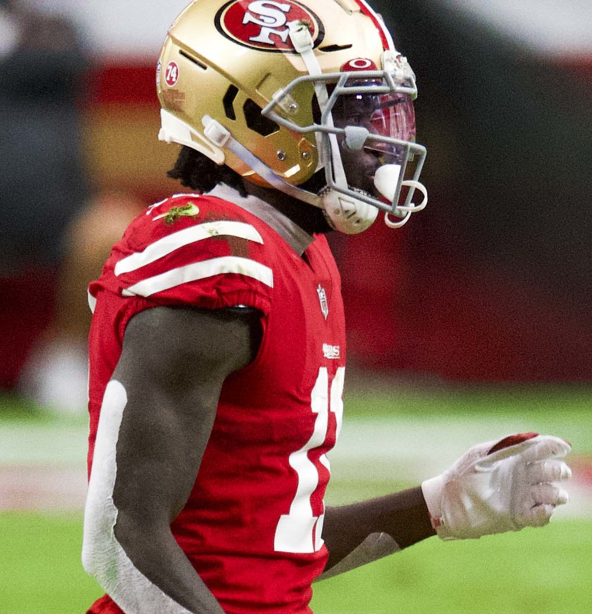 A football running back cutting upfield with the ball