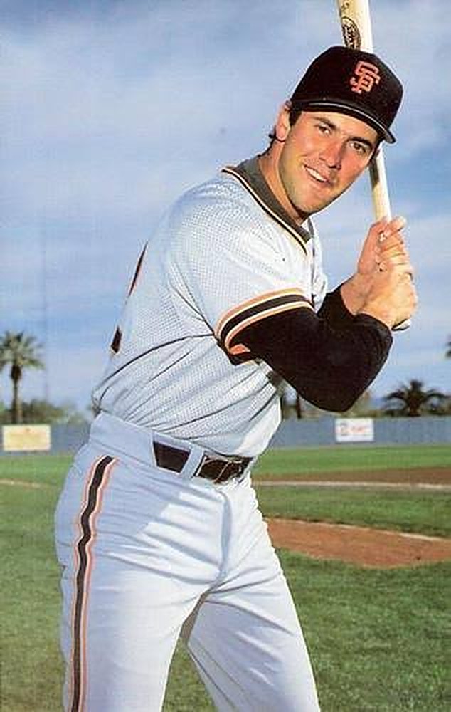 Will Clark smiling in his San Francisco Giants uniform with a bat on his shoulder